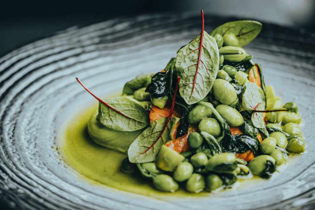 Gourmet green pea salad served at One Belvedere’s farm-to-table restaurant