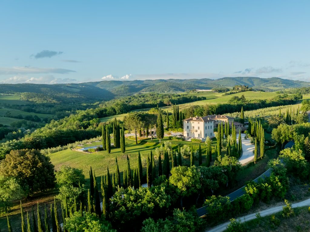 Aerial view of the estate and rolling Chianti countryside during a stay at One Belvedere Tuscany.